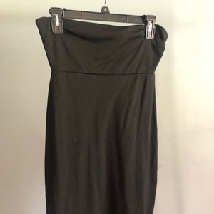 Black dress with single strap around back of neck